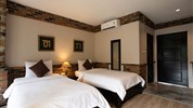 Motive Cottage Resort - Pokoj deluxe